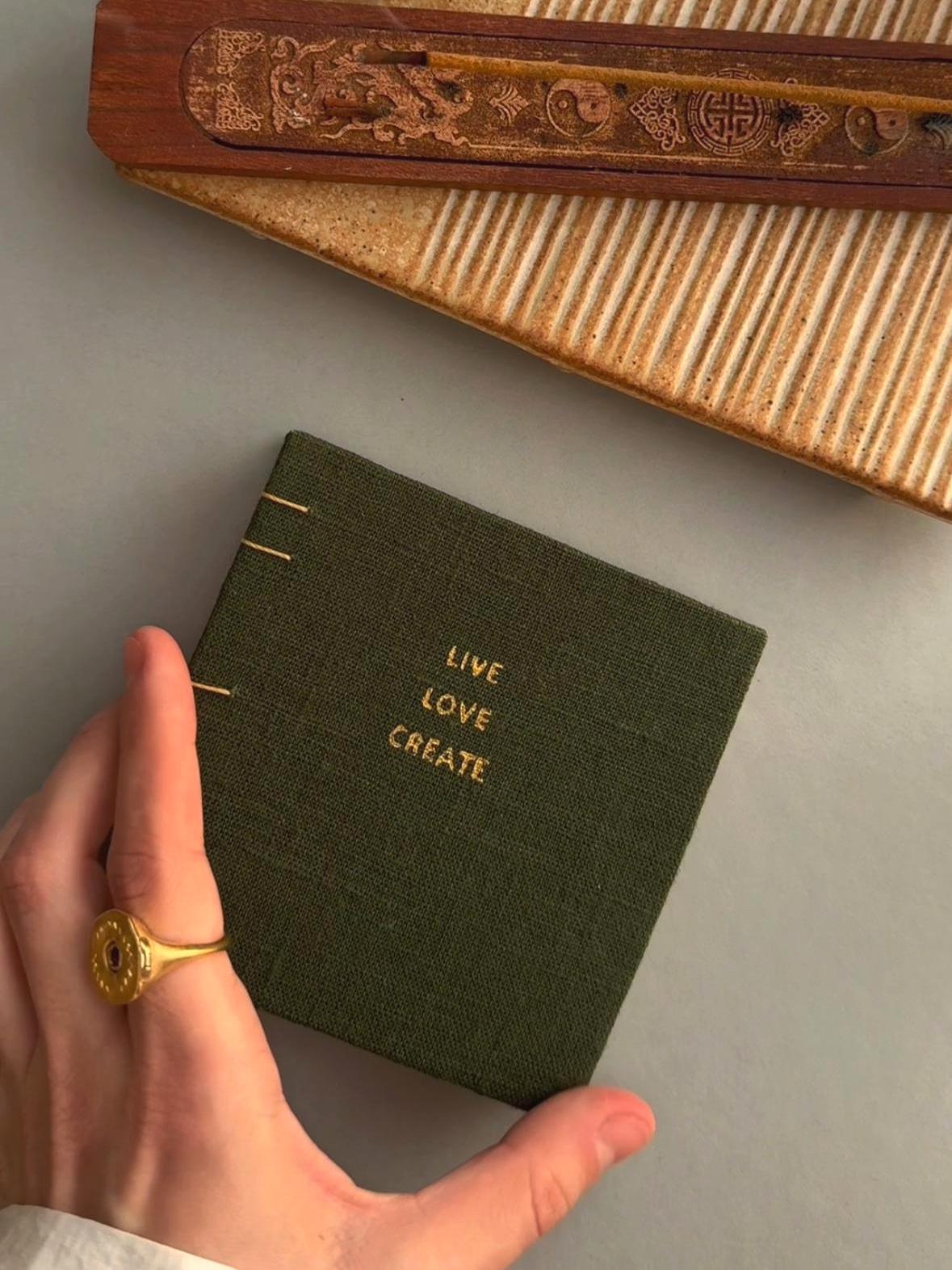 Notebook with quote, sketchbook