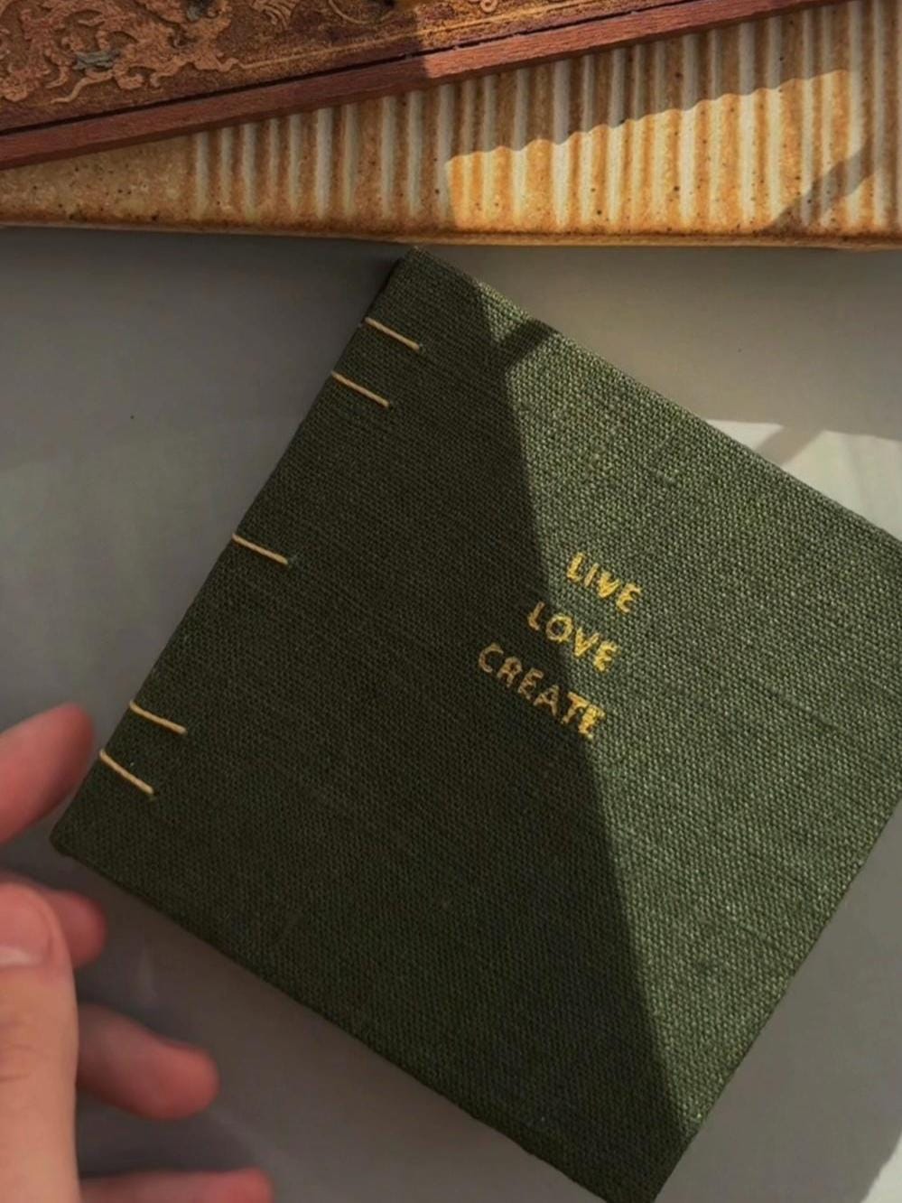 Notebook with quote, sketchbook