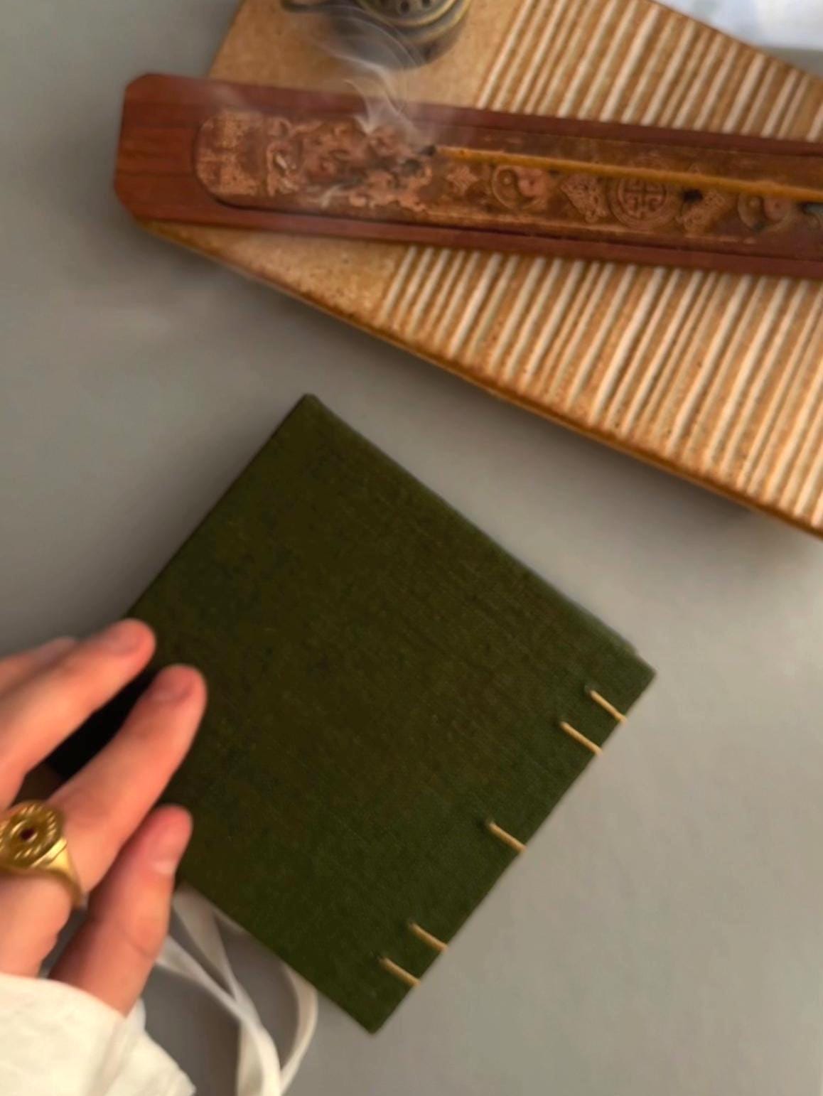 Notebook with quote, sketchbook