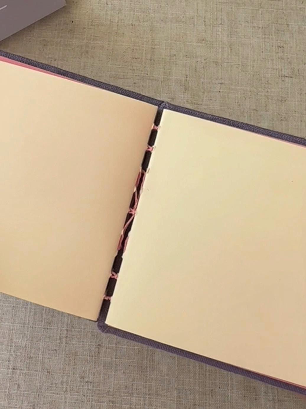 Notebook with purple linen cover, sketchbook