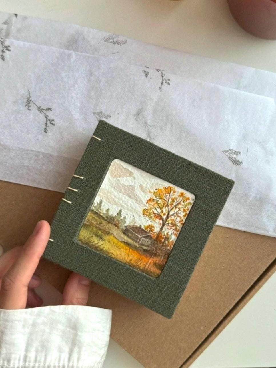 Notebook with watercolour painting, sketchbook