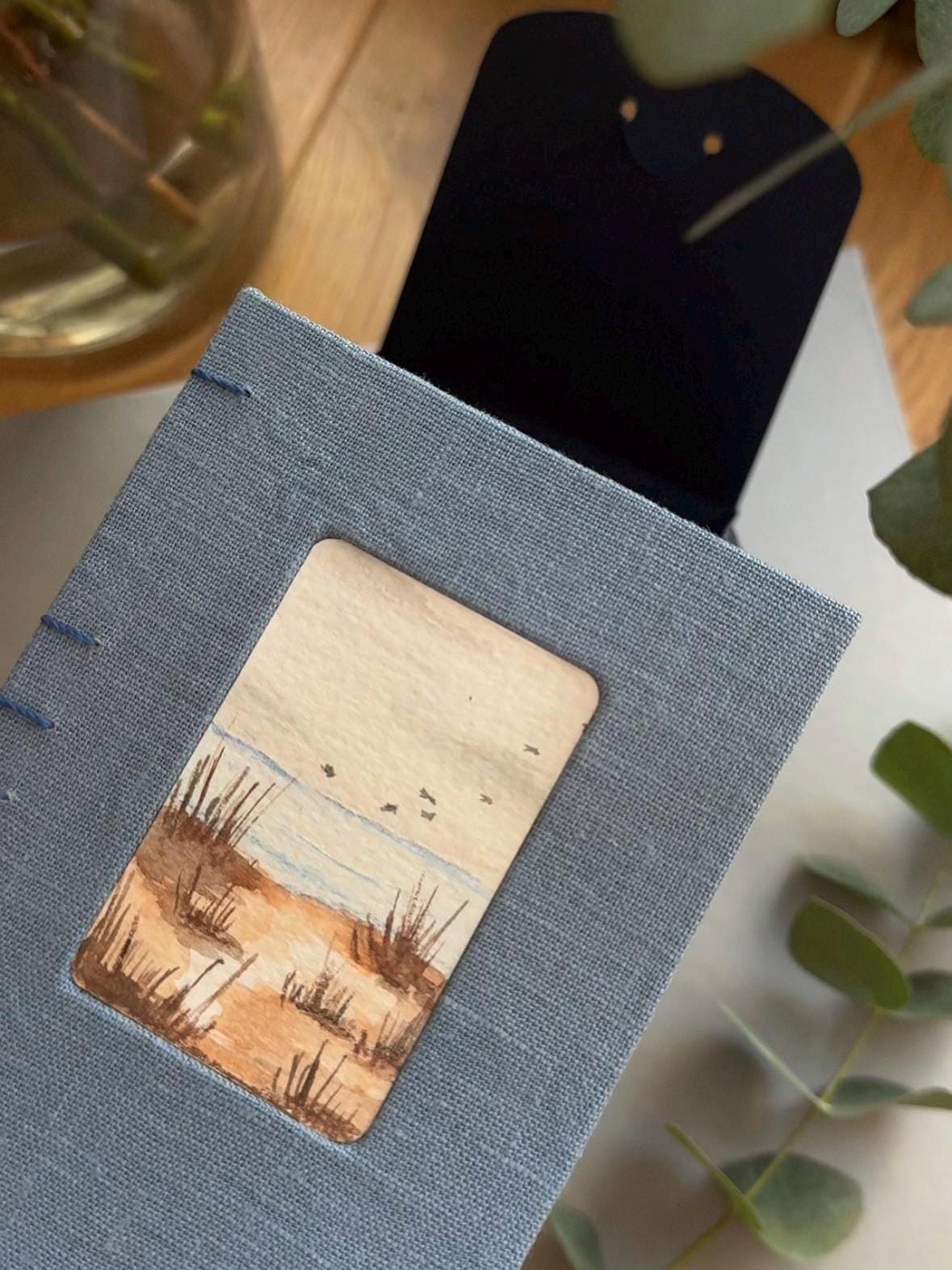 Notebook with watercolour painting, sketchbook