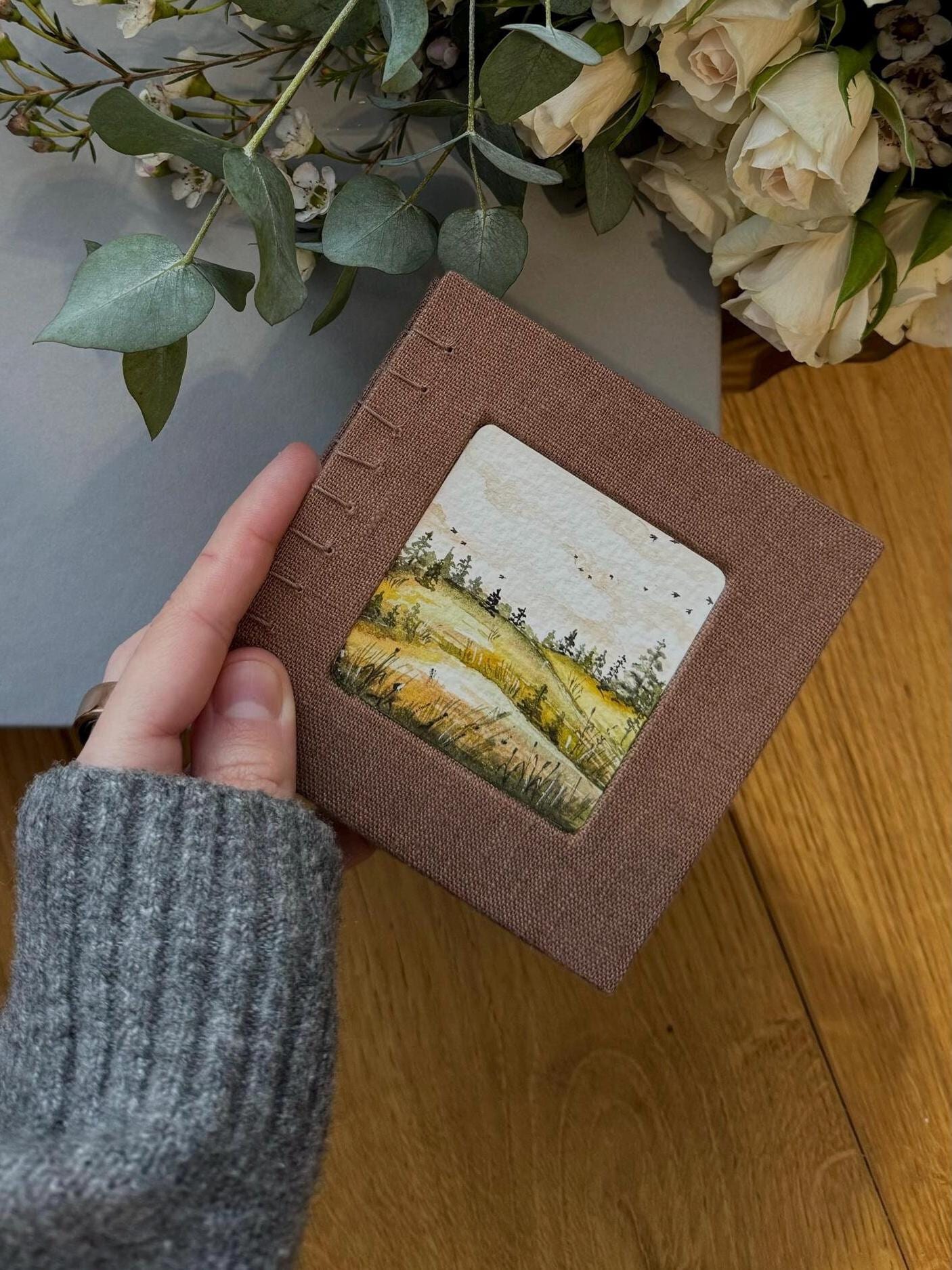 Notebook with watercolour painting, sketchbook