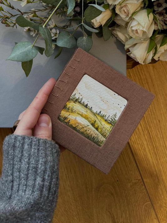 Notebook with watercolour painting, sketchbook