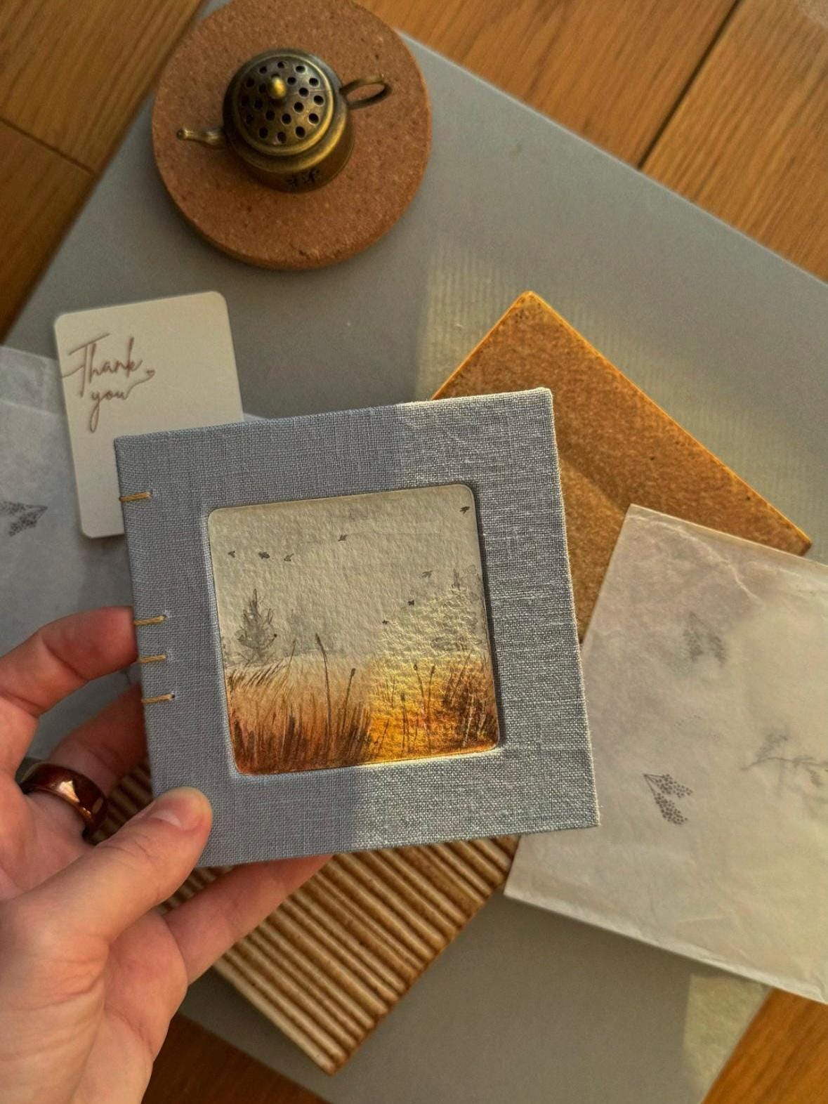 Notebook with watercolour painting, sketchbook